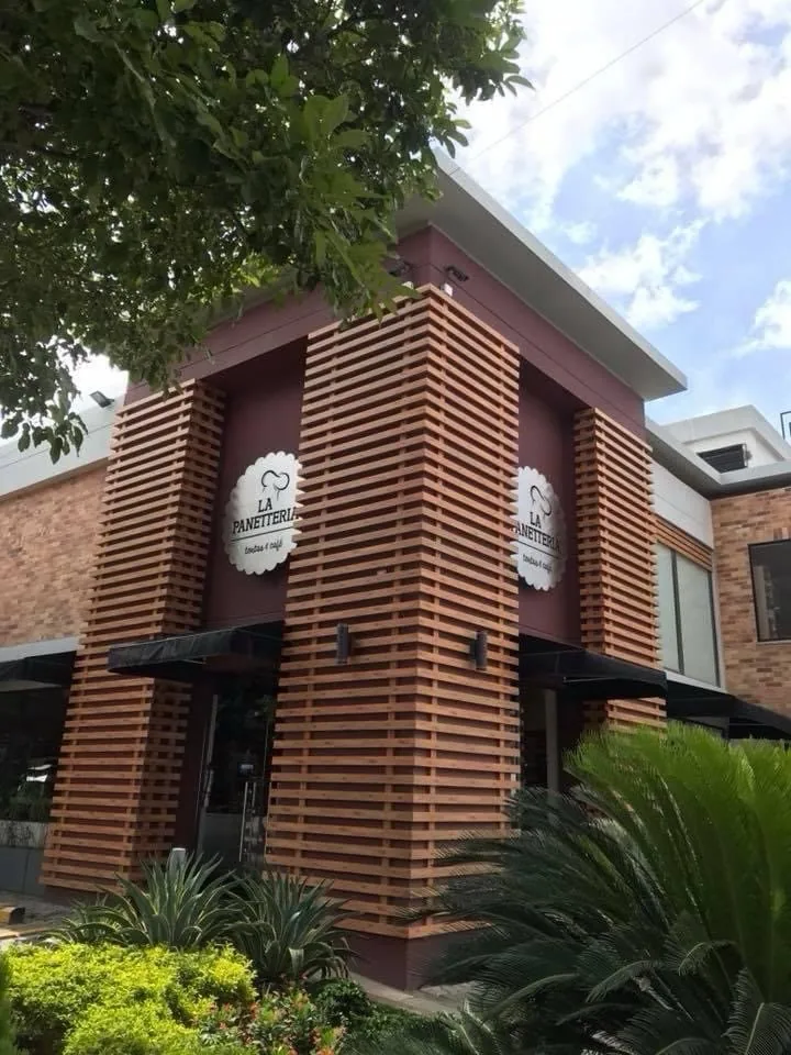 Cafe facade with timber screens